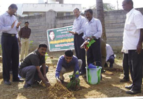 Krishna Kumar Rangachari plants a sapling on the occasion while S Venkatesan looks on