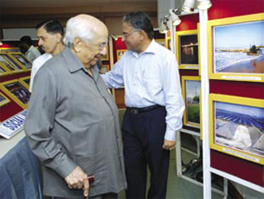 P S Jayaraman taking K S Narayanan and U Suresh Rao around at the photo exhibition at Chennai