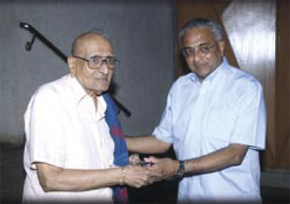 N Sankar honouring S Rajam - with Sruti for 23 years