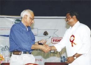Employees Union President R Jayamurugan receiving memento from M N Radhakrishnan