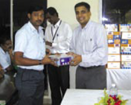 R Madhu receiving the kaizen prize and certificate