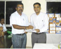 P A Paramasivam receiving the long service award