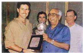 Australia captain receiving the trophy from K S Narayanan in September 1989