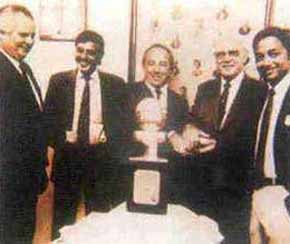 M G Kailis (centre) and N Sankar (extreme right) seen with the trophy. 