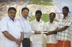 NS Mohan handing over the contribution