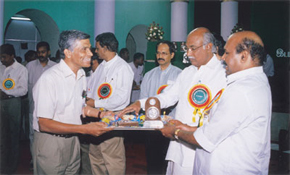 V Ramachandran receives the awards from A Anwar Raja