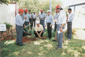 Raj Ahuja, FMO Operations, Director, Cabot Corporation, USA, planting a sapling at Cabot Sanmar, Mettur.