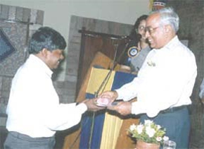 B Natraj, Managing Director, Corporate, Chemplast Sanmar Limited, giving away the long service award to M Veluchamy.